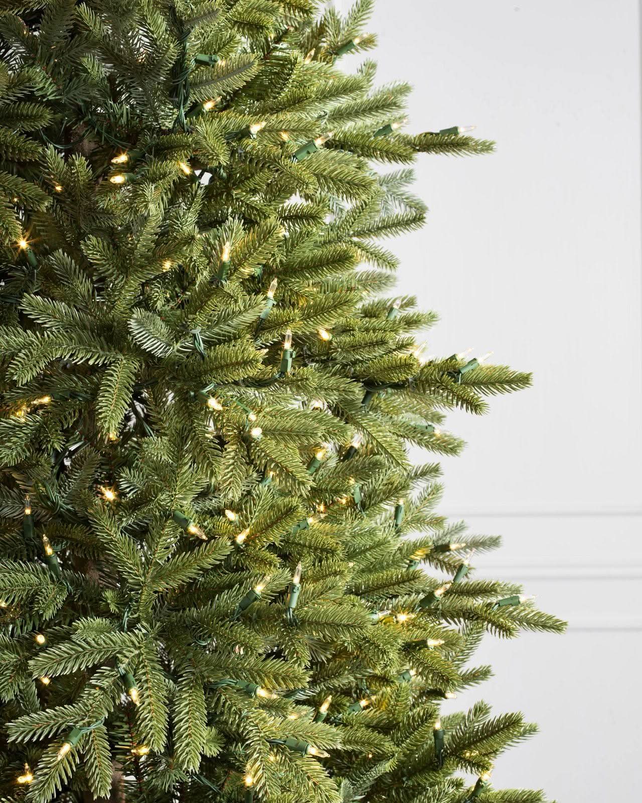 Silverado Slim Christmas Tree with Articulated Branches, Metal Stand and Built-in Micro LEDs