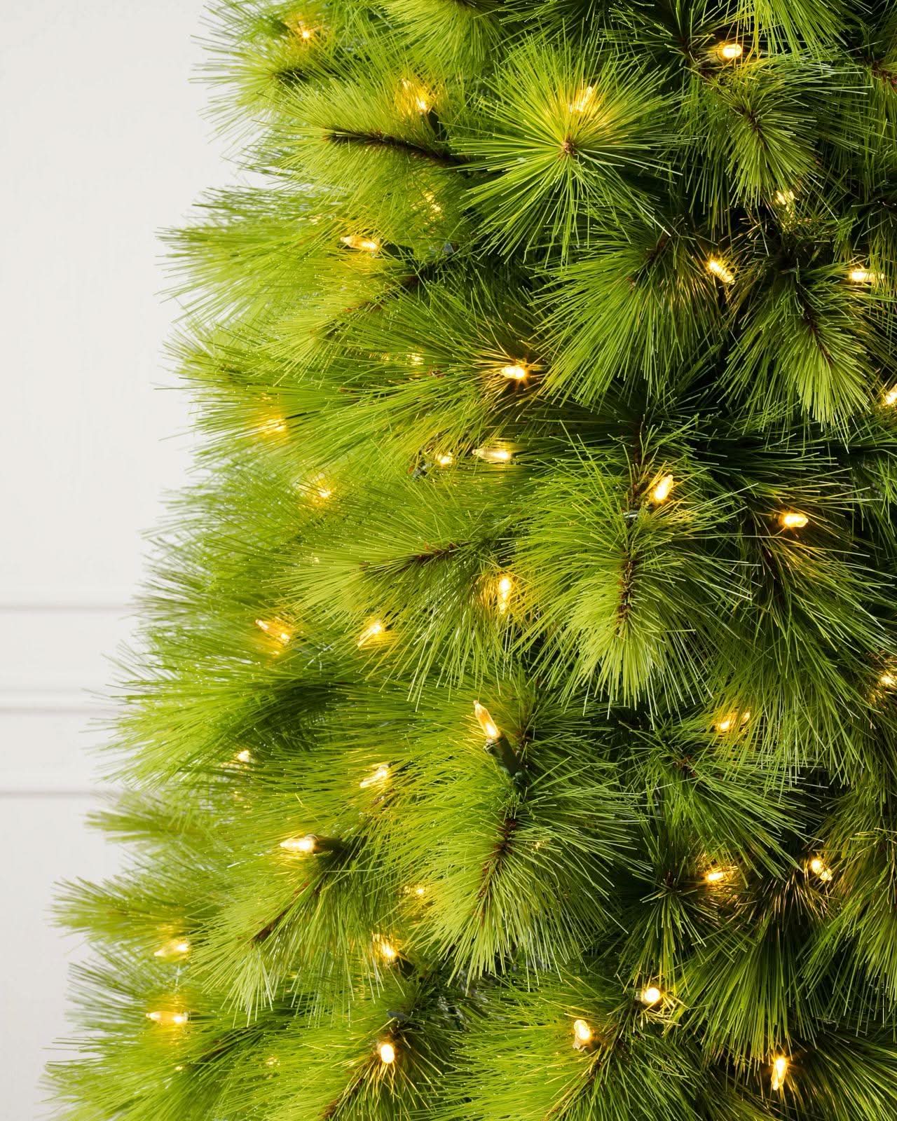 Slim Monterey Pine Christmas Tree with Hinged Branches, Metal Stand and Built-in Micro LEDs