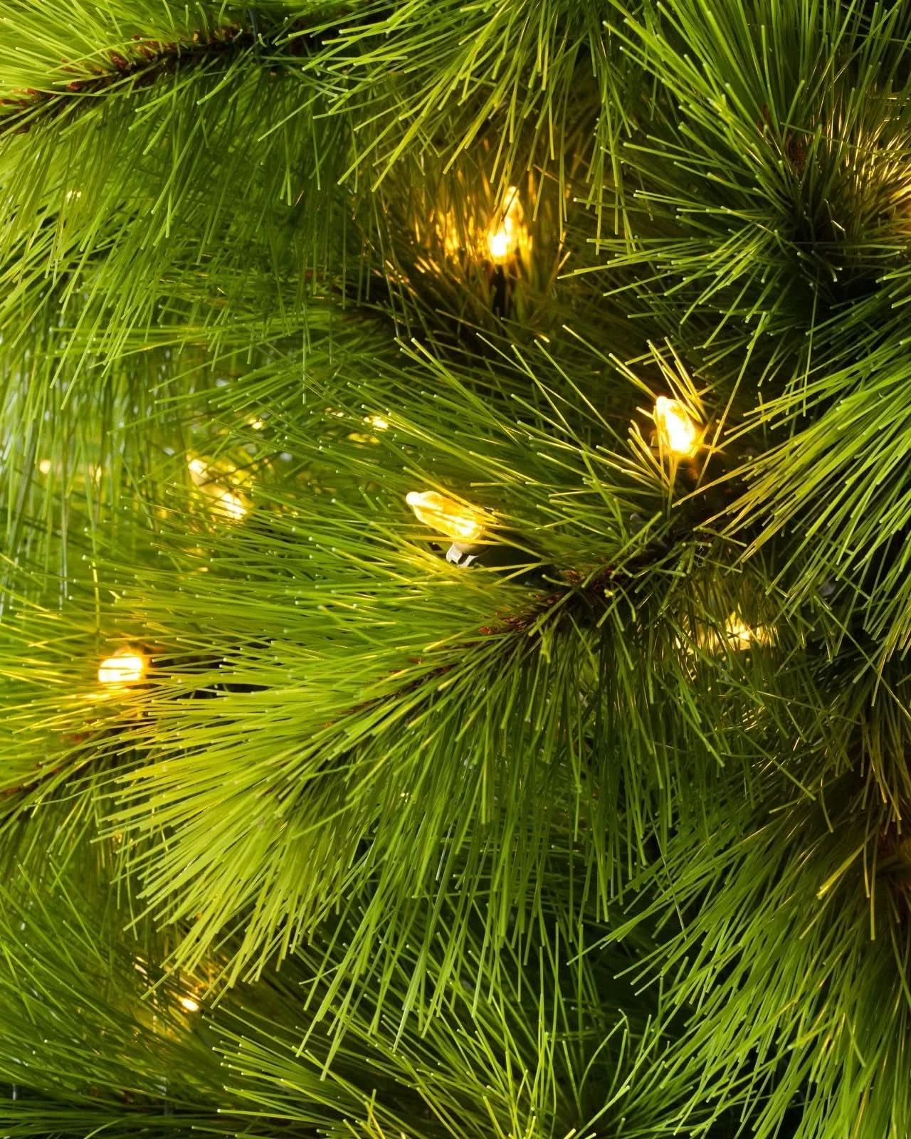 Slim Monterey Pine Christmas Tree with Hinged Branches, Metal Stand and Built-in Micro LEDs