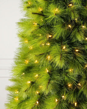 Slim Monterey Pine Christmas Tree with Hinged Branches, Metal Stand and Built-in Micro LEDs
