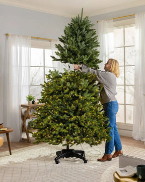 Premium Green Christmas Tree with Articulated Branches, Metal Stand with Wheels and Built-in Micro LEDs